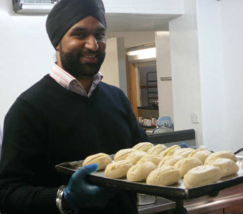 Volunteer at St George's Crypt with freshly cooked bread